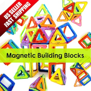 May include: A set of colorful magnetic building blocks in various shapes, including triangles and squares. The blocks are made of plastic and have a translucent appearance. The blocks are scattered on a white background.  Magnetic Building Blocks.