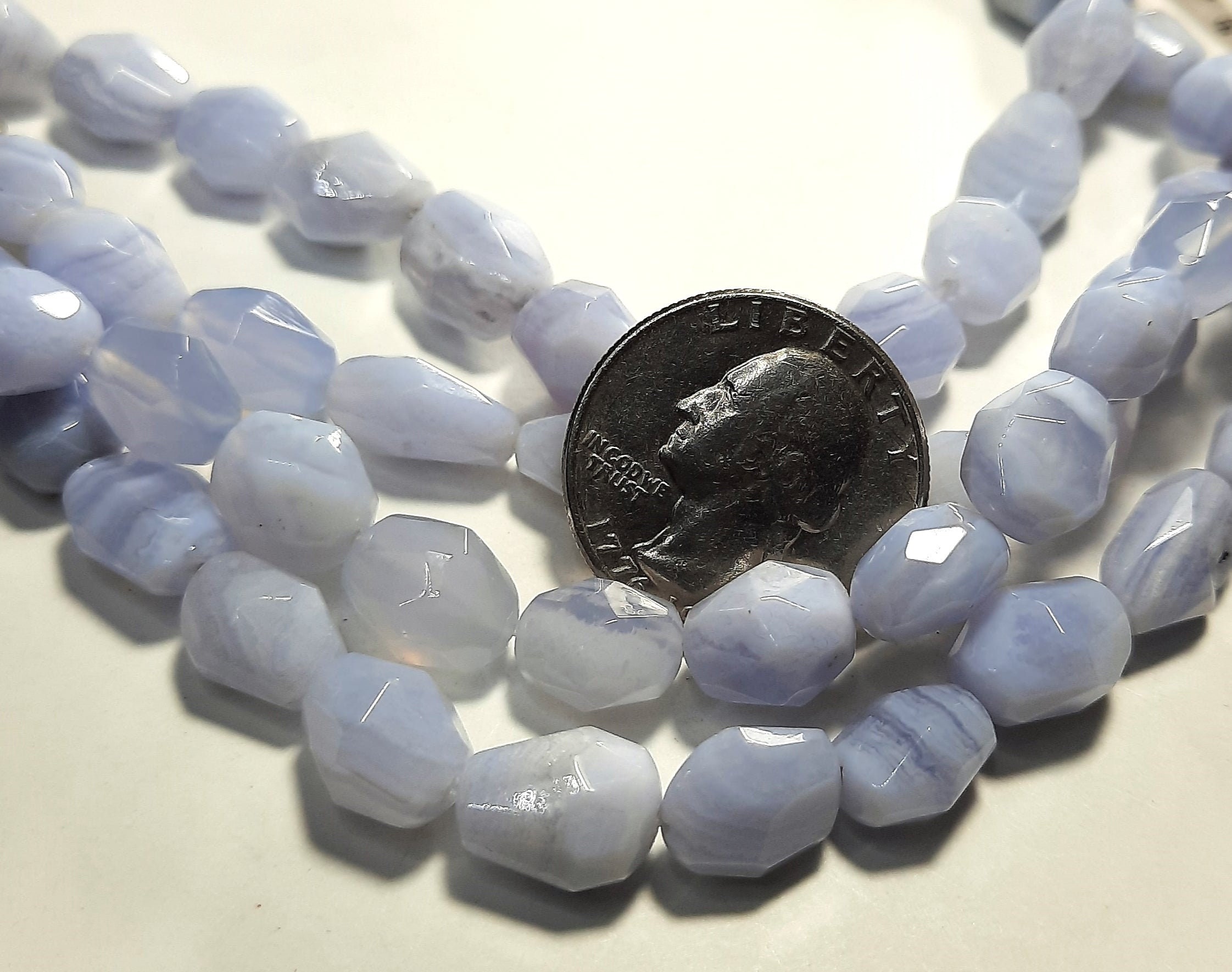 8-12mm Blue Lace Agate Freeform Faceted Barrel Gemstone Beads 8-12mm Blue Lace Agate Freeform Faceted Barrel Gemstone Beads