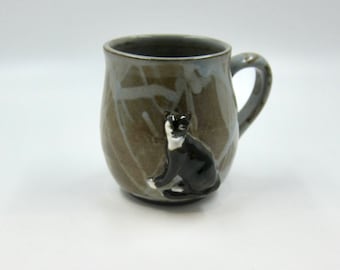 Tuxedo Cat Bas Relief on Light Blue Mug of Dark Brown Stoneware