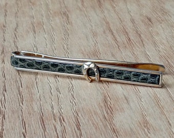 Hufeisen-Krawattenklammer aus goldfarbenem Metall und Leder