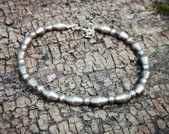 Pulseira de pérolas de prata