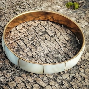 Armband i pärlemor och mässing