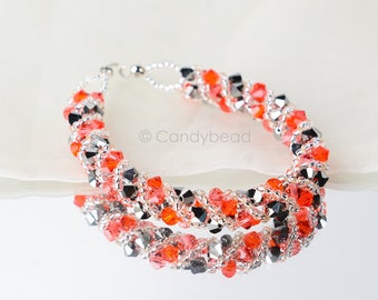 Crystal swarovski bracelet; glass bracelet; Red Coral twisty swarovski bracelet, 7.5 inches and 2 inches adjustable chain