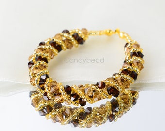 Crystal swarovski bracelet; glass bracelet; Gold Brown twisty swarovski bracelet, 6.5 inches and 2 inches adjustable chain