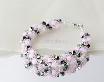 Crystal swarovski bracelet; glass bracelet; Silver Pink twisty swarovski bracelet, 7.5 inches and 2 inches adjustable chain