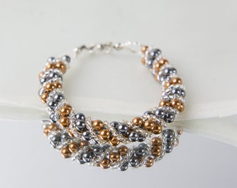 Crystal swarovski bracelet; glass bracelet; Brown gold twisty swarovski pearl bracelet, size 7.5 inches and 2 inches adjustable chain