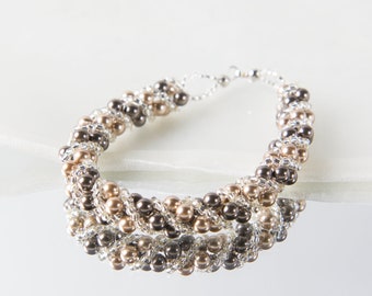 Crystal swarovski bracelet; glass bracelet; Brown gold twisty swarovski pearl bracelet, 7.5 inches and 2 inches adjustable chain