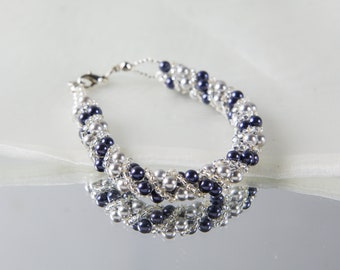 Crystal swarovski bracelet; glass bracelet; white and blue twisty swarovski bracelet, size 7 inches and 2 inches adjustable chain