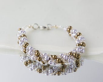 Crystal swarovski bracelet; glass bracelet; Pearl twisty swarovski bracelet, 7.5 inches and 2 inches adjustable chain