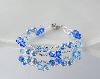 Crystal swarovski bracelet; glass bracelet; Blue swarovski bracelet, size 7 inches and 2 inches adjustable chain