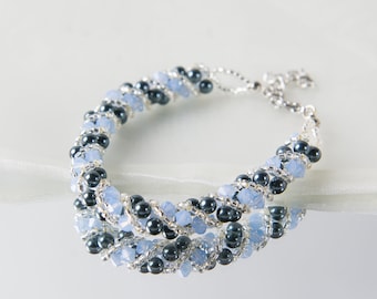 Crystal swarovski bracelet; glass bracelet; Blue twisty swarovski bracelet, size 7 inches and 2 inches adjustable chain