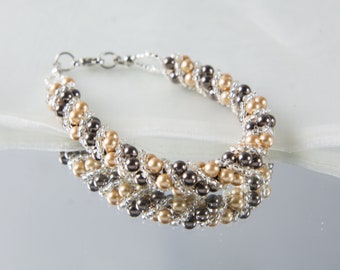 Crystal swarovski bracelet; glass bracelet; Brown gold twisty swarovski pearl bracelet, size 7 inches and 2 inches adjustable chain