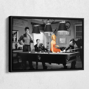 May include: A black and white photo of four people playing pool. The woman in the center is wearing a bright orange dress. The text on the wall reads "Aaron  LaForest Brook Jeanne Lawyers of Legend".
