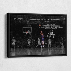 May include: A black and white photo of a basketball player shooting a three-pointer. The player is wearing a blue jersey with the number 3 on it. The text "NBA ALL TIME THREE POINTERS RECORD 12.15.2021-MADISON SQUARE GARDEN 2,974TH 3-POINTER" is visible in the image. The player's signature is also visible in the image.