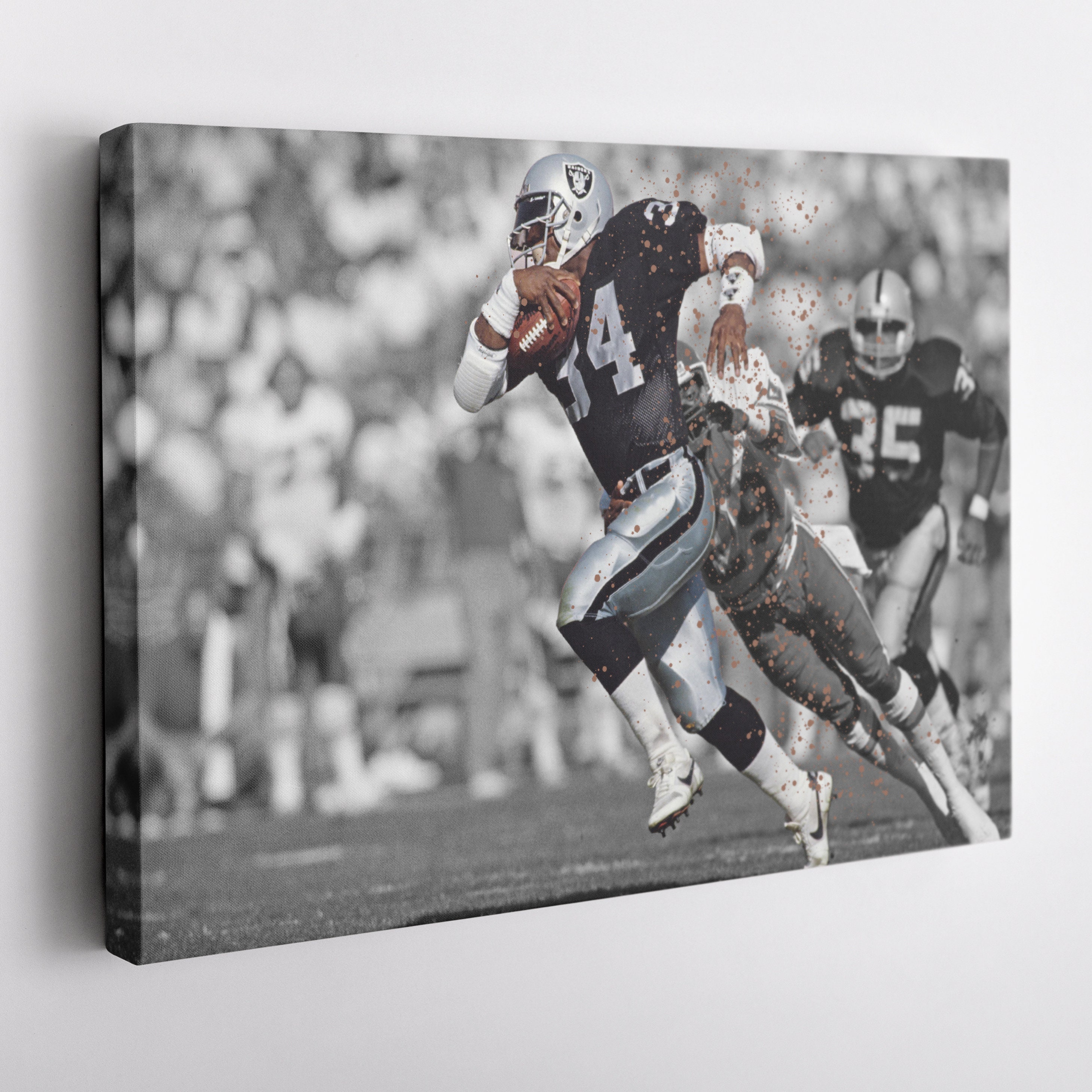 Bo Jackson Full Back for the Los Angeles Raiders Dodges a Tackle