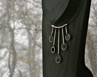 Milky Way- Hand fabricated and Oxidized Sterling Silver Necklace with Five Dangling Spirals