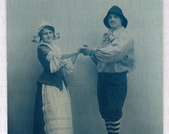 1910s Cyanotype Photo Postcard - A Couple in Dutch Looking Costumes Including Wooden Shoes - English Postcard Co (J. Hey) Printed in Germany