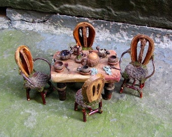 Fae table with chairs and tea service