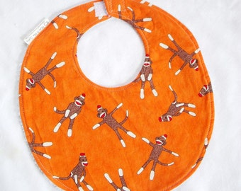 Sock Monkeys on Orange - Boutique Bib - terry cloth backing