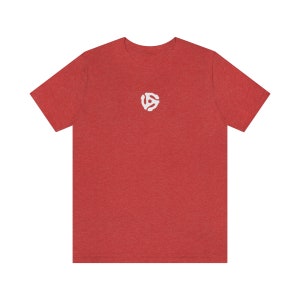May include: Red t-shirt with a white vinyl record symbol on the front.