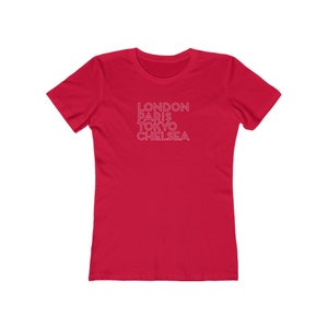 May include: Red women's t-shirt with white text that reads "LONDON PARIS TOKYO CHELSEA"
