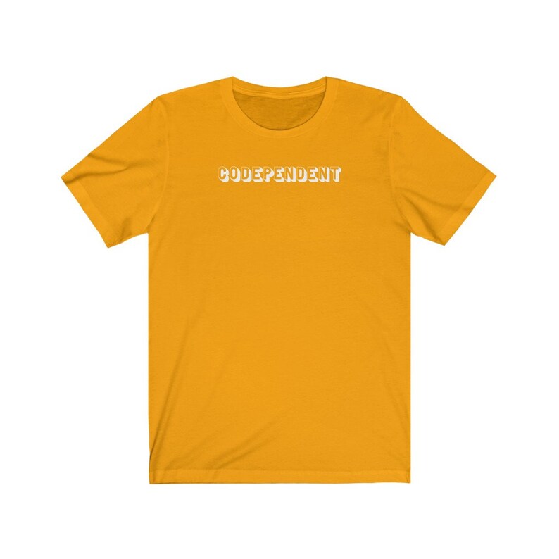 May include: A yellow short-sleeved t-shirt with the text "CODEPENDENT" printed in white on the front.