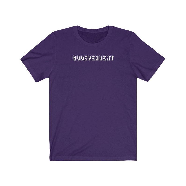 May include: Purple short-sleeved t-shirt with the text "CODEPENDANT" in white.