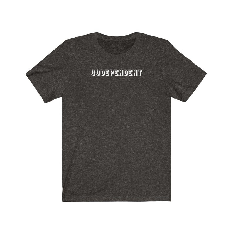 May include: A dark heather grey t-shirt with the text "CODE-DEPENDENT" printed in white on the front.