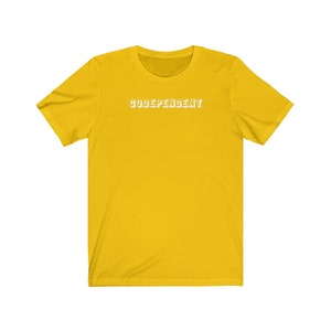 May include: Yellow short-sleeved t-shirt with the text "CODEPENDENT" in white.