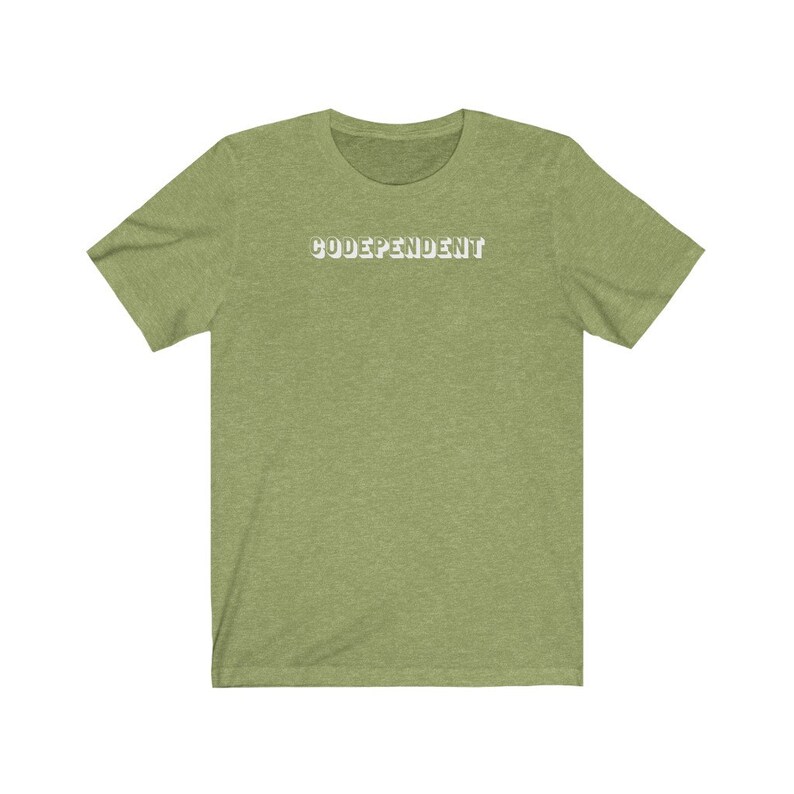 May include: A green short-sleeved t-shirt with the word "CODEPENDENT" printed in white on the front.