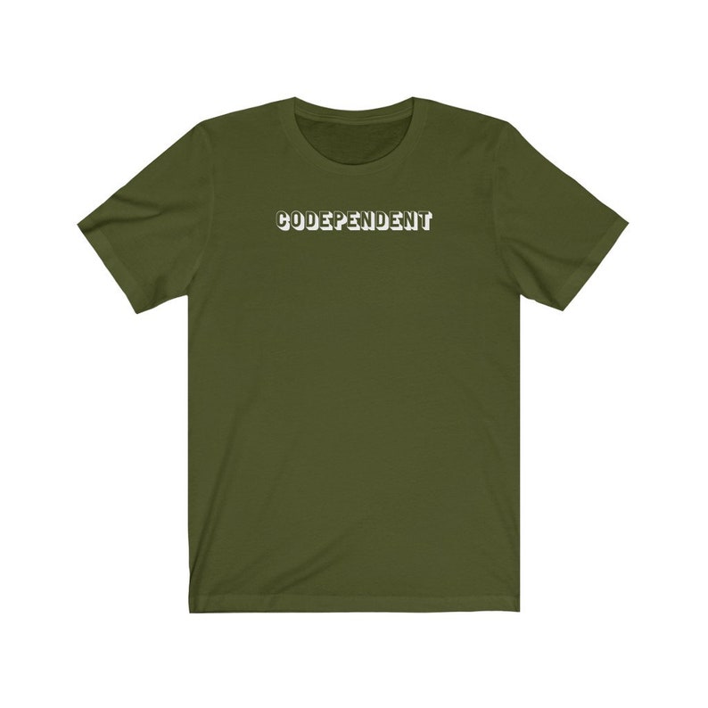 May include: A green short-sleeved t-shirt with the word "CODEPENDENT" printed in white on the front.