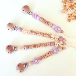 Personlig nappklämma med rosett och prästkrageblommor, babyshowerpresent för flickor, anpassad nappklämma med babynamn