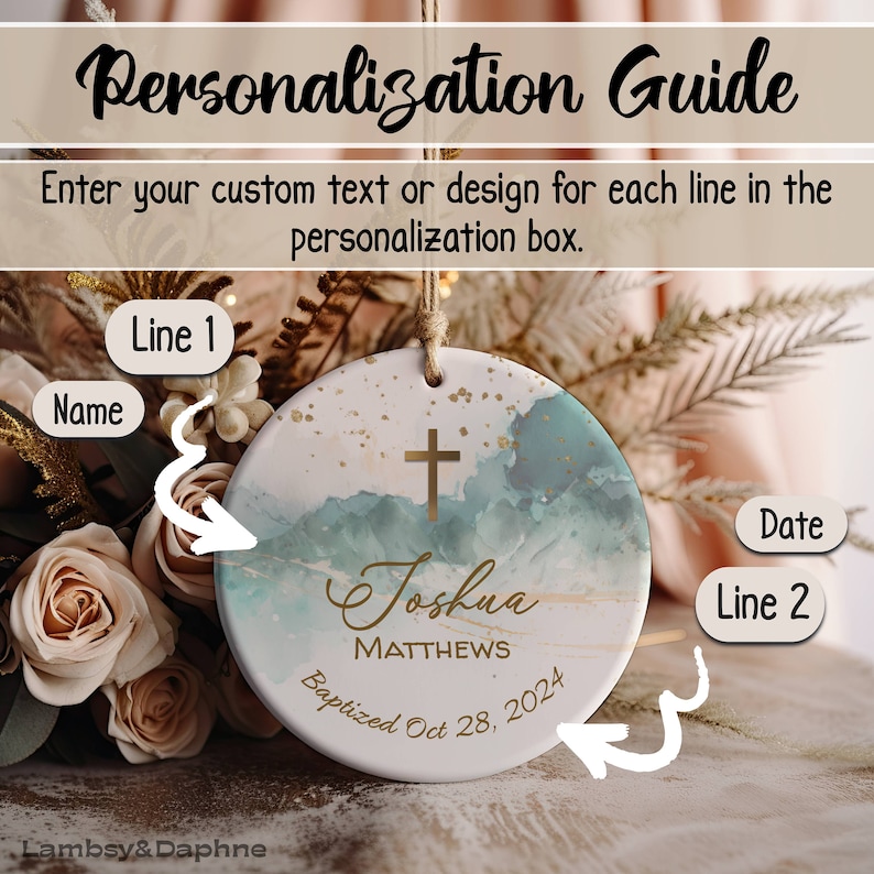May include: A white ceramic ornament with a watercolor-style design in shades of blue and gold. The ornament features a gold cross, the name "Joshua Matthews", and the text "Baptized Oct 28, 2024".