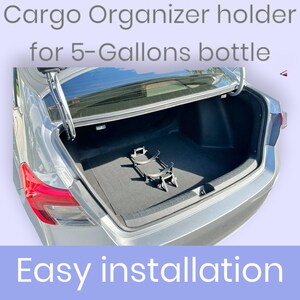 May include: A grey car with the boot open, showing a black metal cargo organiser holder for 5-gallon bottles. The text "Easy installation" is displayed at the bottom of the image.