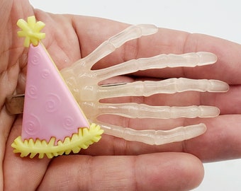 Pink Party Hat Glow in the Dark Skeleton Hand Hair Clip