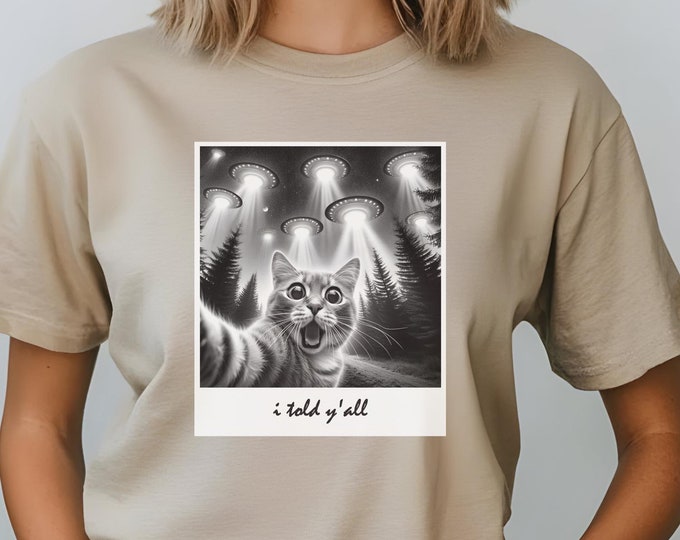 UFO Cat T-Shirt | Funny Alien Cat Tee | I Believe in Cats Graphic Shirt | Space Lover Unisex Tee | Quirky Cat Lover Gift | Alien Cat Shirt