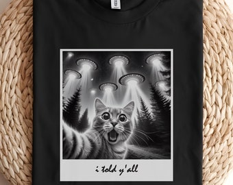 UFO Cat T-Shirt | Funny Alien Cat Tee | I Believe in Cats Graphic Shirt | Space Lover Unisex Tee | Quirky Cat Lover Gift | Alien Cat Shirt