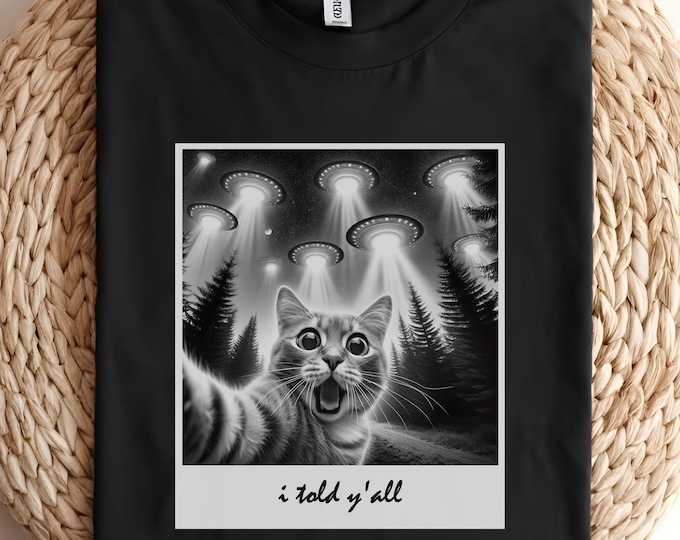 UFO Cat T-Shirt | Funny Alien Cat Tee | I Believe in Cats Graphic Shirt | Space Lover Unisex Tee | Quirky Cat Lover Gift | Alien Cat Shirt