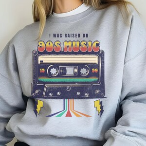 Raised on 90s Music T-Shirt | Retro Nostalgia Graphic Tee | Unisex 90s Lover Shirt | Vintage Music Apparel | Fun Gift for Music Fans