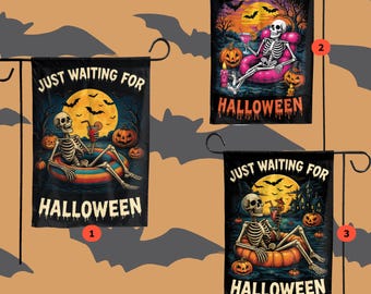 May include: Halloween garden flags featuring a skeleton in a pool float, holding a drink, with pumpkins and a full moon. The flags read "JUST WAITING FOR HALLOWEEN".