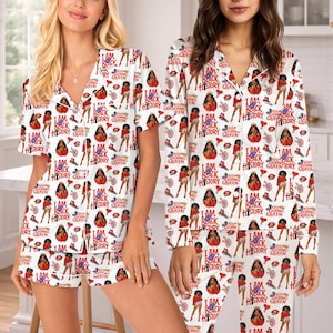 May include: White pajama set with a repeating pattern of illustrations and text. The text includes "I AM BLACK HISTORY QUEEN" and "KEEP GOING QUEEN". The illustrations include a woman in a red outfit, a red lipstick, and a high heel.