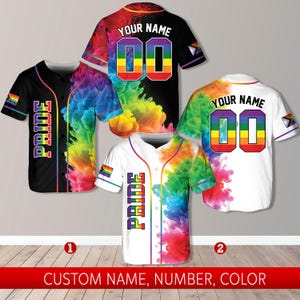 May include: Four baseball jerseys with rainbow-colored smoke designs. Two jerseys are black, and two are white. Each jersey has the word "PRIDE" and a rainbow flag. The text "YOUR NAME" and the number "00" are on the back of two jerseys. The text "CUSTOM NAME, NUMBER, COLOR" is at the bottom.