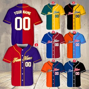 May include: Eight baseball jerseys with different color combinations. Each jersey has a two-toned design with a contrasting color down the middle. The jerseys have a button-up front and short sleeves. The text "Team Name" and the number "00" are printed on the front of each jersey.
