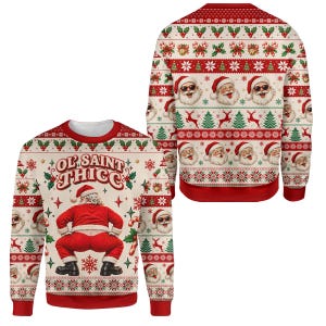 Puede incluir: Una sudadera de cuello redondo y manga larga con fondo crema y patrones festivos en rojo y verde. La parte delantera muestra un gráfico de Santa Claus inclinado con el texto OL SAINT THICC. La parte trasera presenta caras de Santa Claus repetidas.