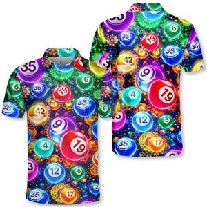May include: Two short-sleeved button-down shirts with a vibrant, colorful pattern. The design features numerous lottery balls in various colors, including red, blue, green, and purple, each with a number. The background is a mix of bright colors and geometric shapes.