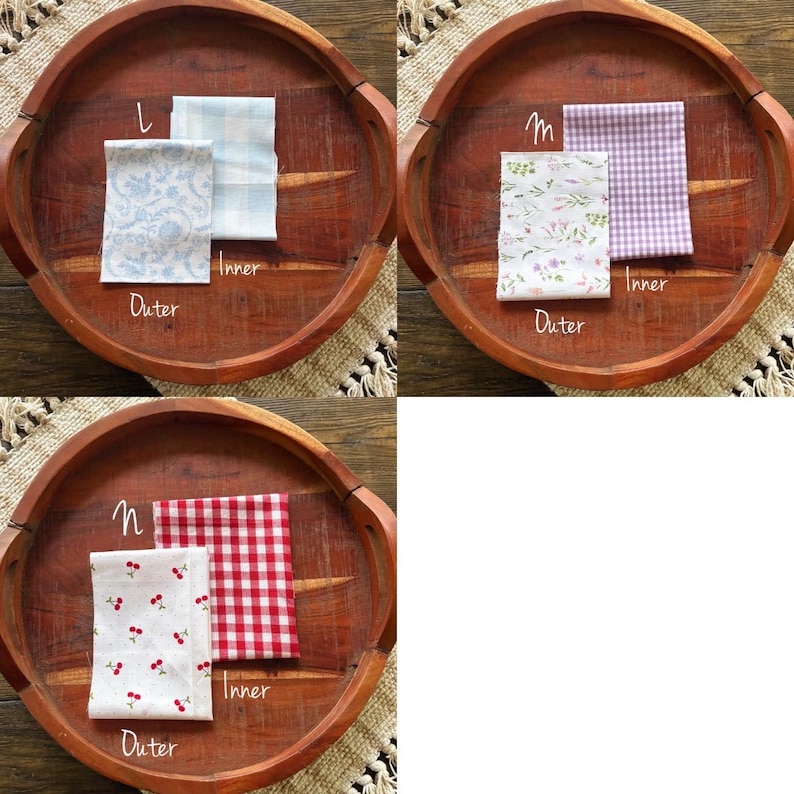 Puede incluir: Tres conjuntos de muestras de tela dispuestas sobre una bandeja de madera. Cada conjunto incluye una tela "Exterior" e "Interior". Las telas exteriores presentan dise&ntilde;os florales, de cerezas y estampados. Las telas interiores tienen patrones de cuadros y cuadros en azul, morado y rojo.
