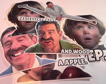 May include: A collection of die-cut stickers featuring images of actors and a child with various facial expressions. Text includes "TASTES LIKE PAINT...", "AND WOOD. A APPLE. EP."