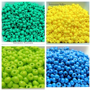 May include: Four containers of small, round, colorful beads. The beads are in the colors seafoam green, yellow, lime green, and dark blue. The containers are labeled "Intensive Seafoam", "Intensive Yellow", "Intensive Lime", and "Intensive Dark Blue".