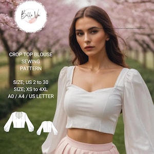 May include: A white crop top blouse sewing pattern with a sweetheart neckline and long sleeves. The pattern is available in sizes US 2 to 30 and XS to 4XL. The pattern is printed on A0, A4, and US Letter paper.