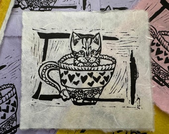 Equali'tea' Kitten in a teacup lino print
